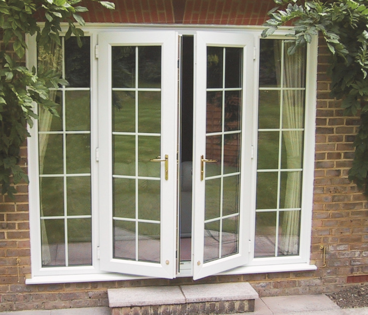 French doors opening onto a garden to create a bright airy space