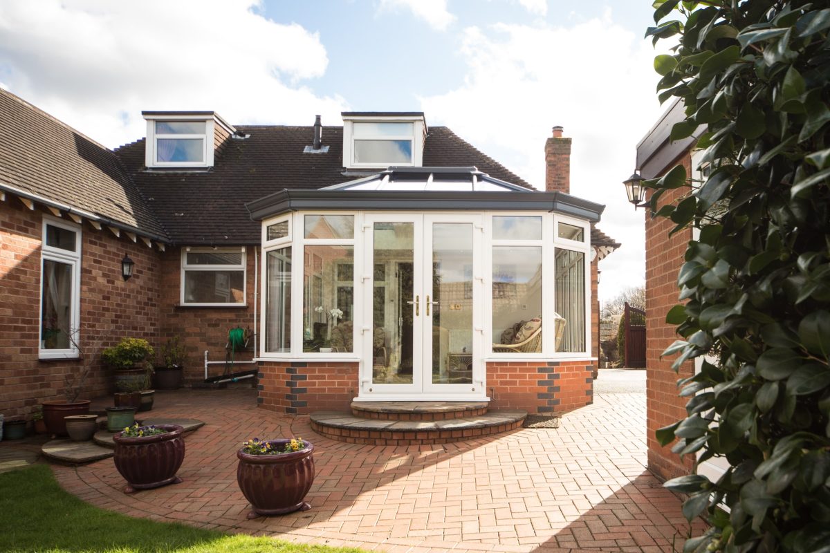 Solid conservatory roof home extension prices