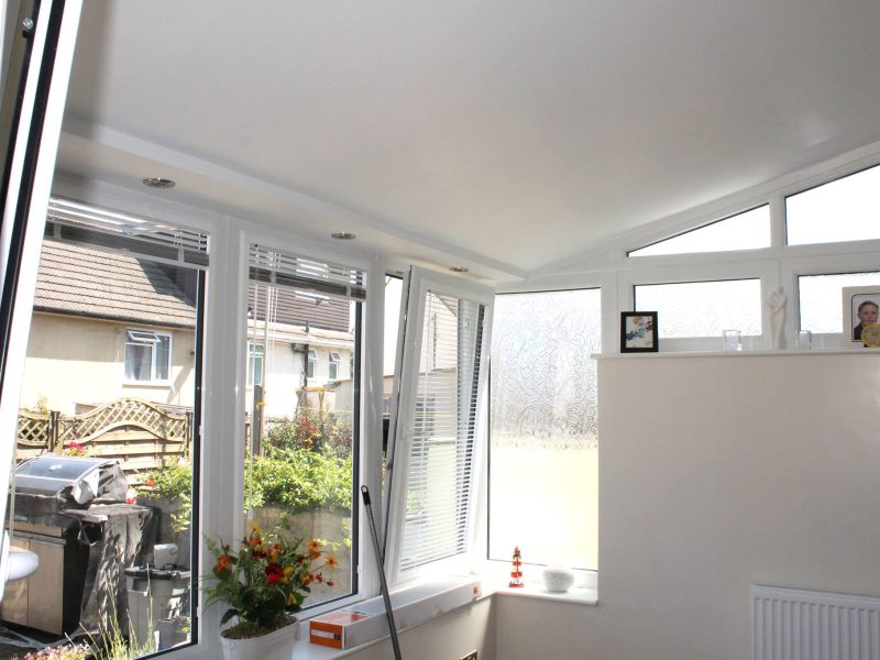 Lean To Conservatory with grey slates. Realistic Home Improvements