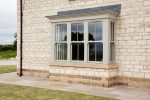 Exterior of vertical sliding sash windows Devon