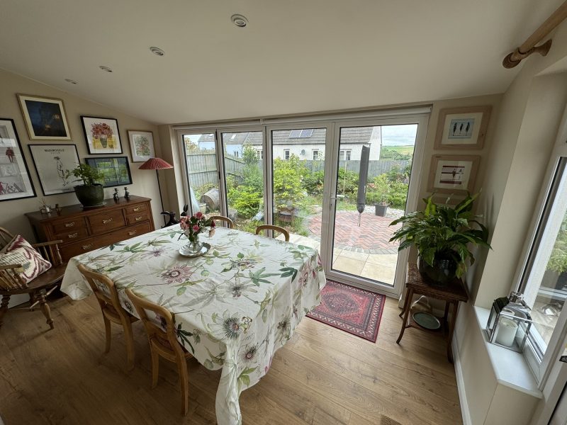 Conservatory with uPVC glass doors and windows by Realistic Home Improvement